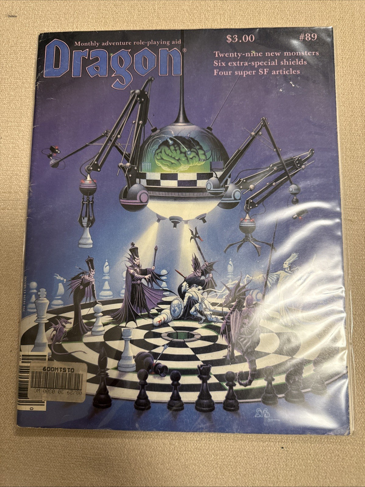 Dragon Magazine #89 (USED) Special shield section. "Creature Catalog" article. Third Denis Beauvais chess-series cover.