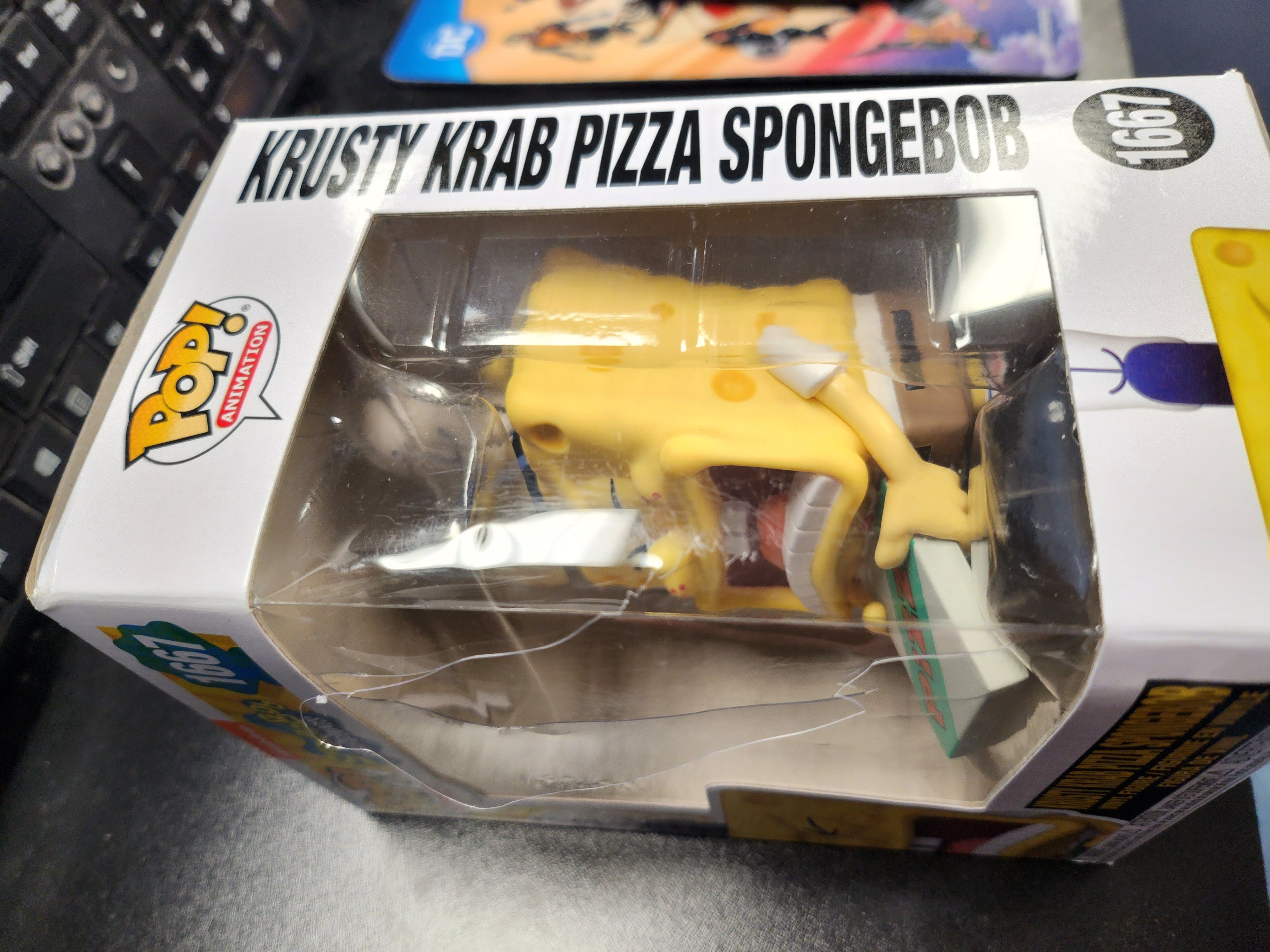POP Figure: Spongebob #1667 -  Krusty Krab Pizza SpongeBob 25th Anniversary (Damaged Box)