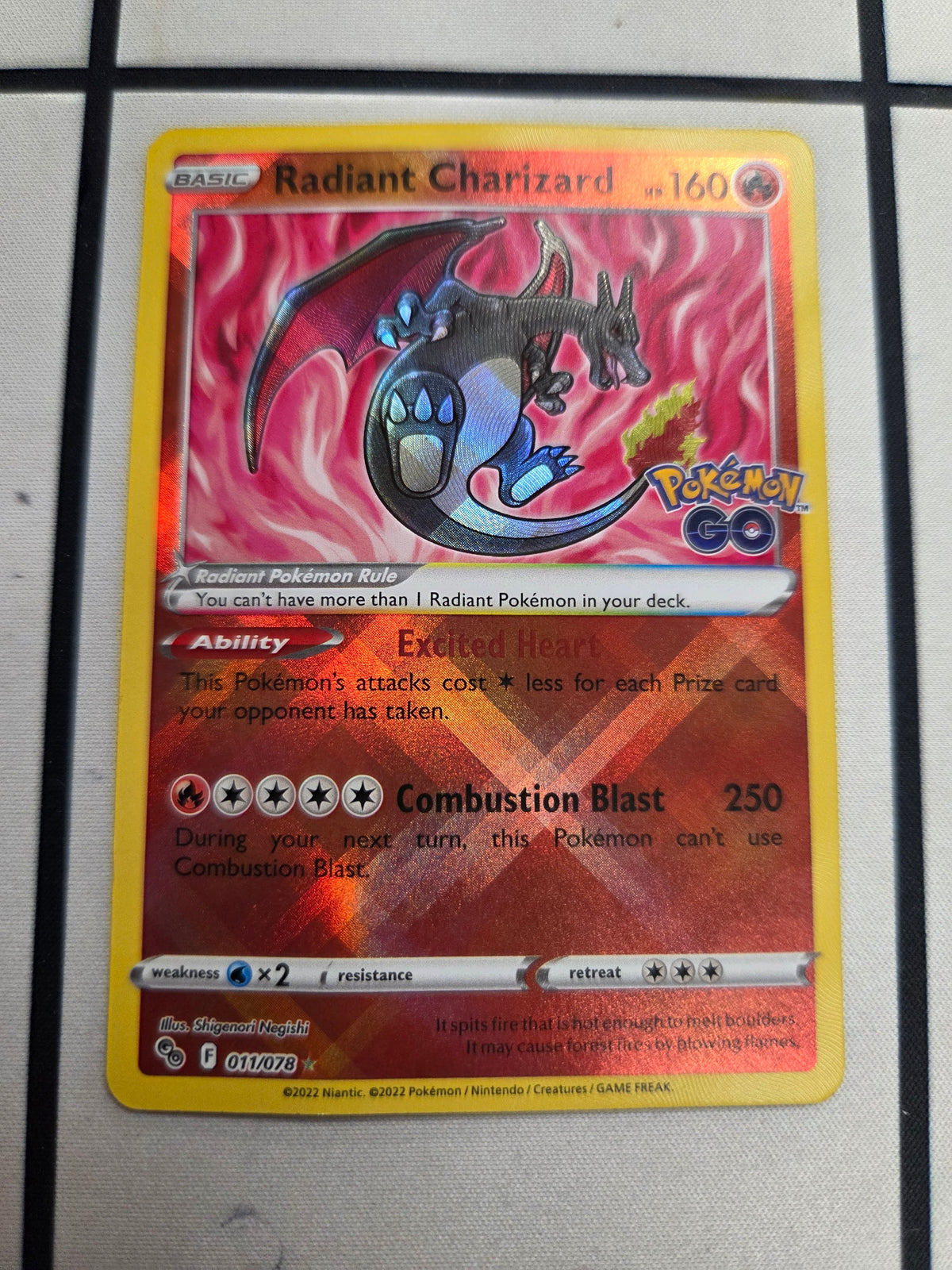 Radiant Charizard - 011/078 (PGO) Radiant Rare - Damaged Holofoil